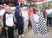 Semarak Hardiknas 2026, Kadis Dikbud Parigi Moutong Lepas Jalan Santai dan Dorong Transformasi Digital Pendidikan