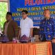 Bupati Erwin Burase Lantik Dua Kepala Desa Antarwaktu, Serahkan Penghargaan Non Litigation Peacemaker